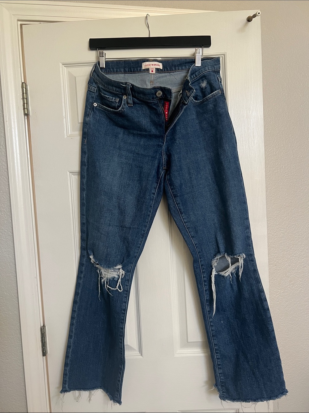 Lucky Brand Dark Blue Distressed boot Jean